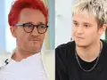 Xavier Michał Wiśniewski z charakterystycznymi rudymi włosami i okularami obok młodszego mężczyzny z blond fryzurą.